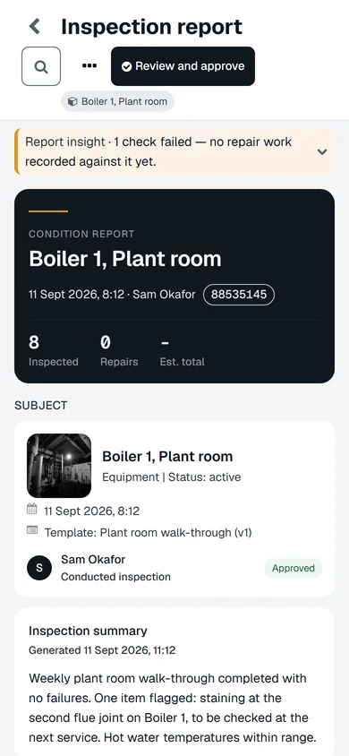 An approved inspection report on a phone.
